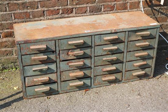 Tin flight of drawers